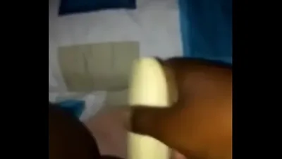 ugandan girl carol uses a banana