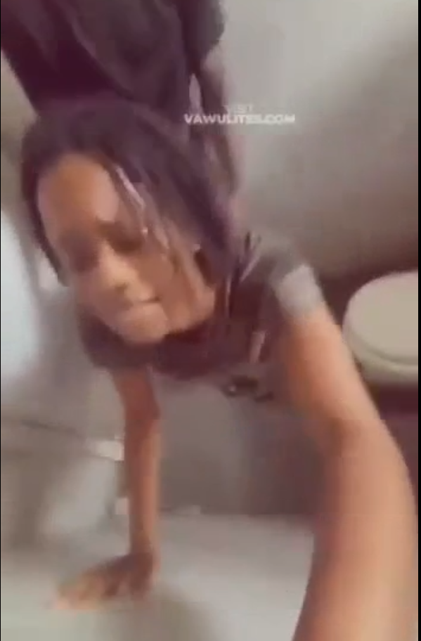 Couple recording themselves in a toilet