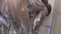 Voluptuous black slut in the shower