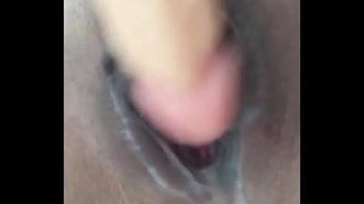 Ebony squirter masturbates with a dildo