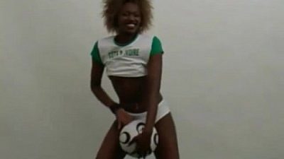 Beautiful African football babe doing a striptease